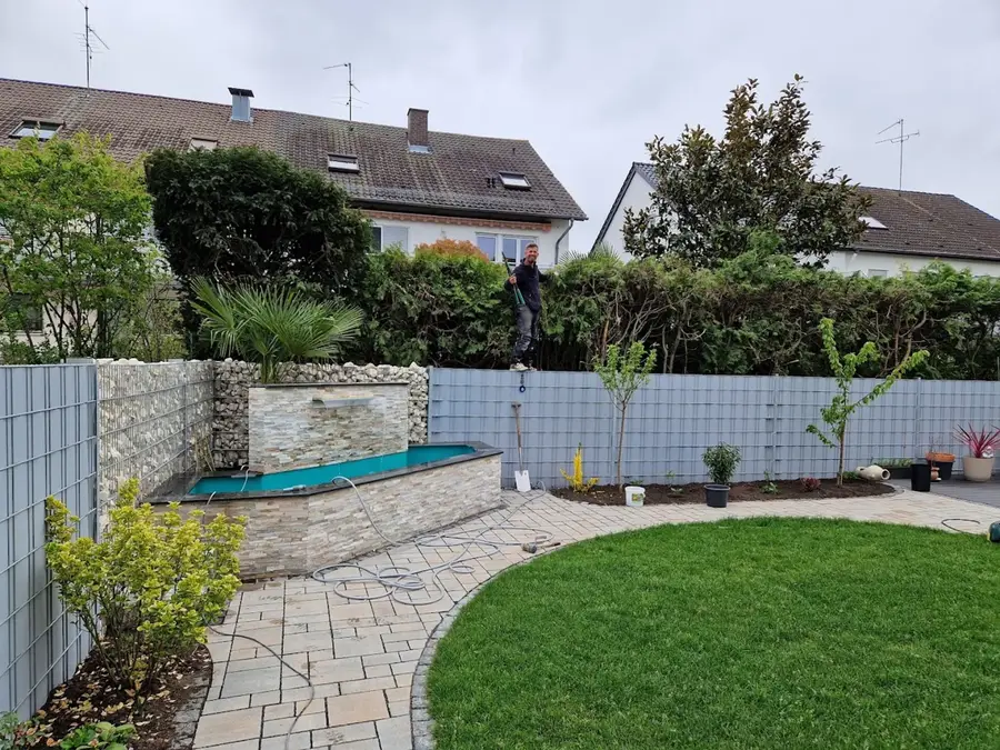 Referenzprojekt: Gartenneugestaltung mit Pool, Naturstein und Pflasterarbeiten